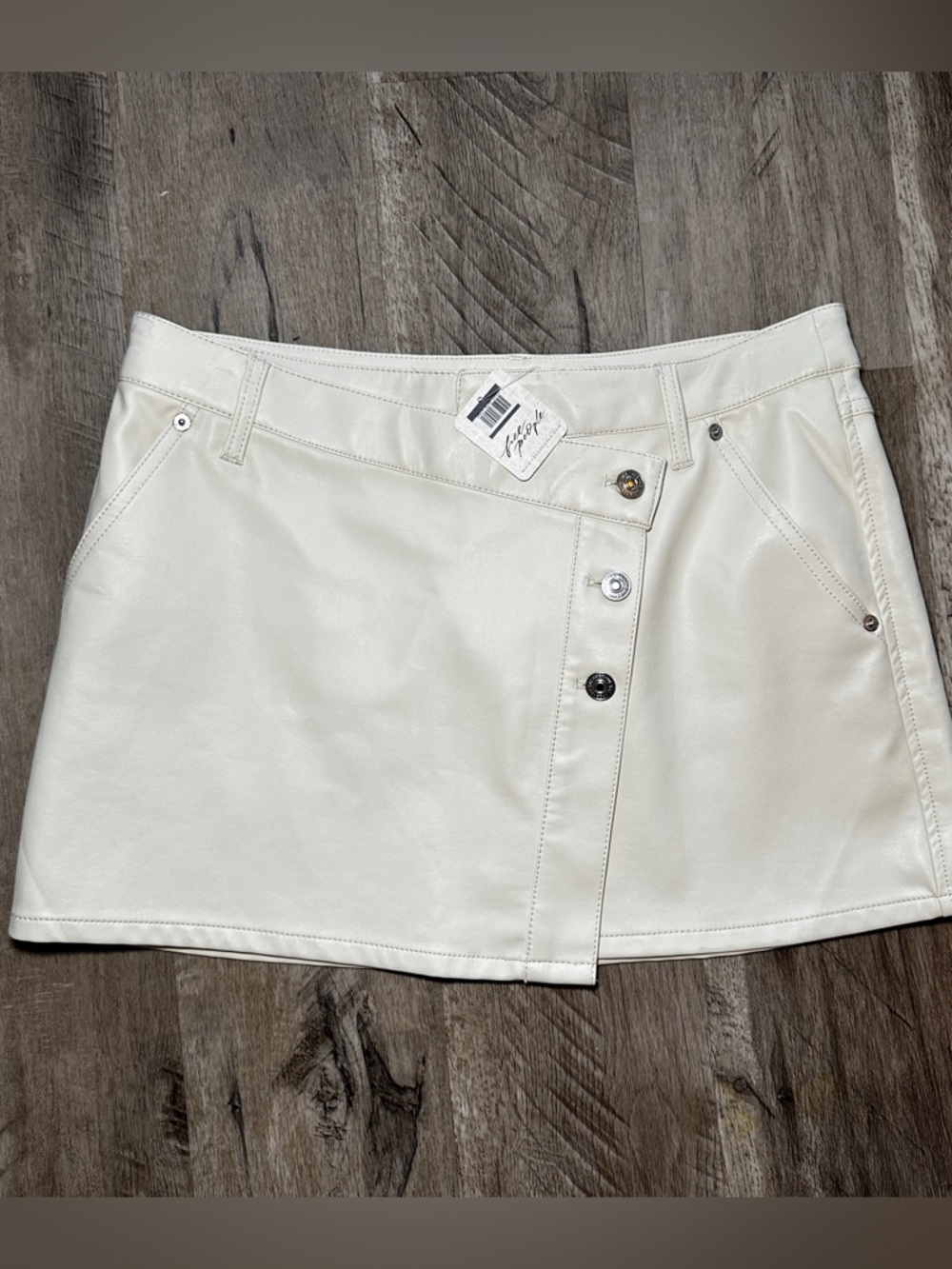 Free People: Faux Leather Beige Mini Skirt with Asymmetric Button Detail - NWT